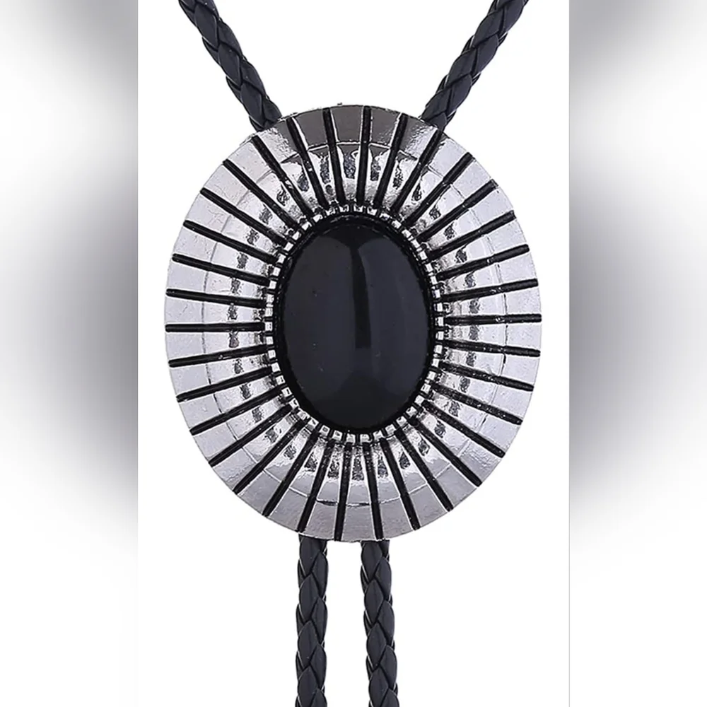 New silver black leather bolo tie. I have MANY others styles Available